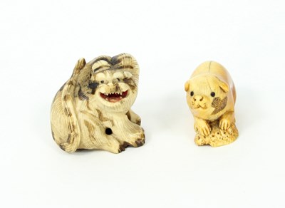 Lot 195 - Two Japanese ivory netsuke of tiger and puppy