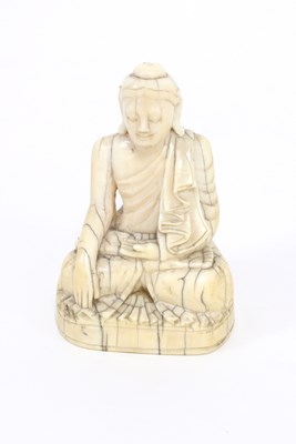 Lot 216 - A Chinese carved ivory figure of Guanyin, Qing...