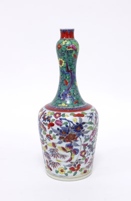 Lot 224 - A Chinese bottle vase, Qing Dynasty, blue and...