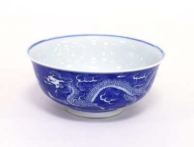 Lot 244 - A Chinese blue and white dragon bowl, bearing...