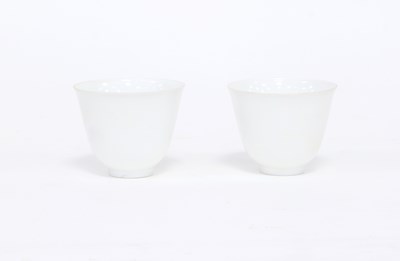 Lot 256 - A pair of Chinese blanc-de-chine tea bowls,...