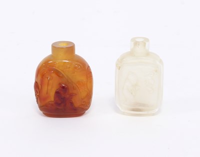 Lot 260 - Two Chinese snuff bottles carved with figures,...