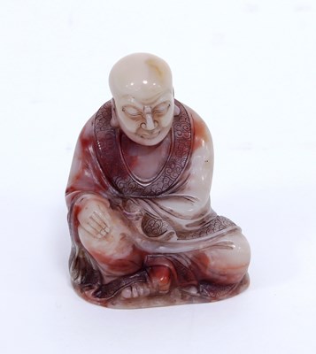 Lot 262 - A Chinese carved soapstone figure of Buddha,...