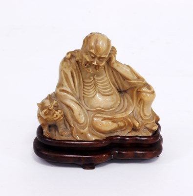 Lot 266 - A Chinese carved soapstone figure of an...