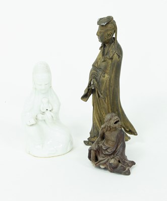 Lot 274 - A blanc-de-chine figure of Guanyin, a Chinese...