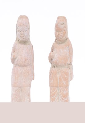 Lot 307 - Two Ming Dynasty pottery tomb figures, 23cm high