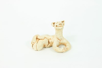 Lot 308 - A Chinese pottery figure of a dog, 10cm high