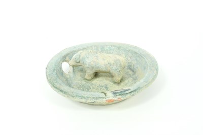 Lot 310 - A Tang Dynasty green glazed bowl, set in the...