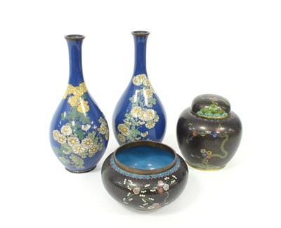 Lot 319 - A pair of cloisonne vases decorated flowers on...