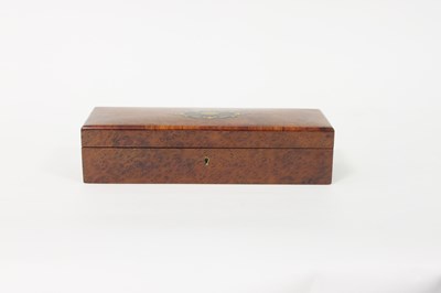 Lot 342 - An amboyna glove box, the lid inset a brass...