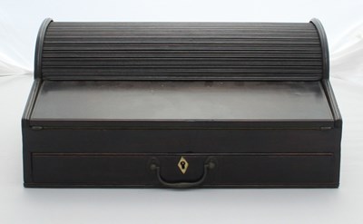 Lot 343 - An ebony writing box, circa 1820, with tambour...