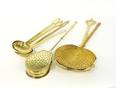 Lot 357 - A 19th Century brass cream skimmer and four...