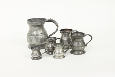 Lot 360 - A pewter pint bellied measure, two gills, two ?...