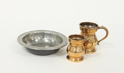 Lot 363 - A pewter bowl and two bell metal bellied...