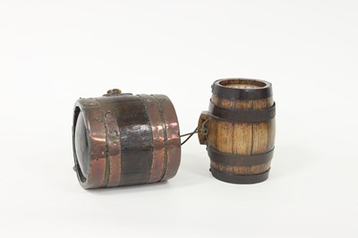 Lot 372 - An oak harvest barrel, 18cm high and another,...