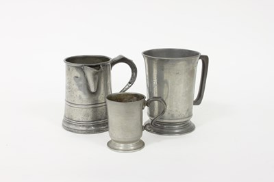 Lot 375 - A 19th Century pewter quart tankard,...