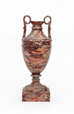 Lot 380 - A mottled red marble two-handled urn (after...