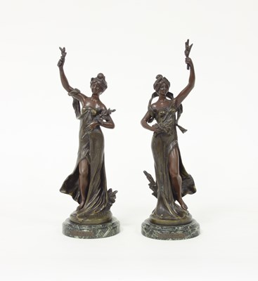 Lot 405 - A pair of spelter figures, after Auguste...