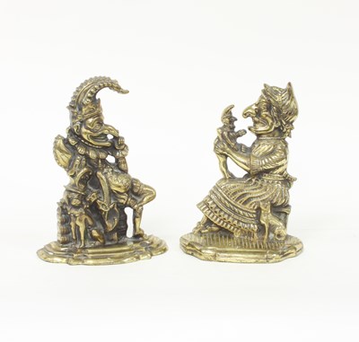 Lot 411 - A pair of brass Punch and Judy door stops,...