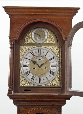 Lot 418 - A longcase clock, the arched brass dial signed...