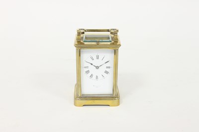 Lot 450 - A late 19th Century gilt brass carriage clock,...