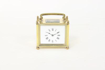 Lot 452 - A rectangular gilt brass carriage timepiece,...