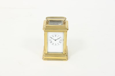 Lot 453 - A miniature gilt brass carriage clock with...