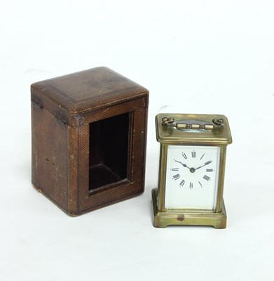 Lot 463 - A gilt brass carriage clock in a leather case