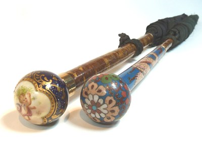 Lot 482 - A parasol, the cloisonne handle with dragon...