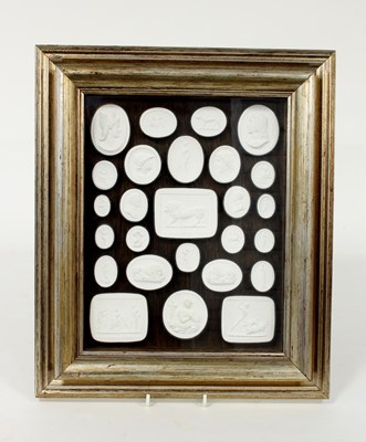 Lot 498 - A collection of 25 plaster intaglios, framed...