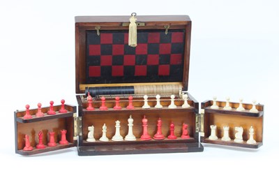 Lot 510 - A Victorian walnut games compendium, the twin...