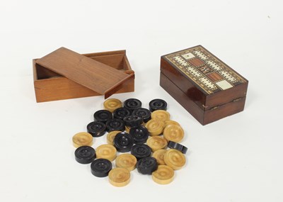 Lot 511 - A quantity of boxwood and ebonised draughts...