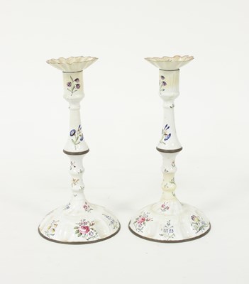 Lot 512 - A pair of Bilston enamel candlesticks, circa...