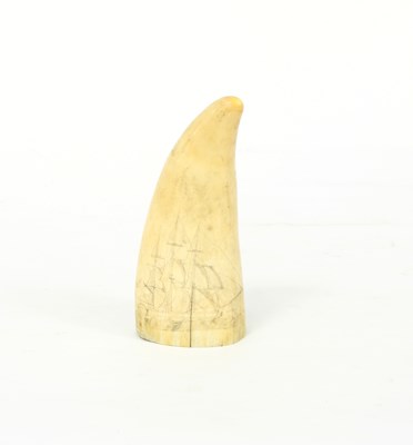 Lot 515 - A scrimshaw sperm whale tooth, decorated a...