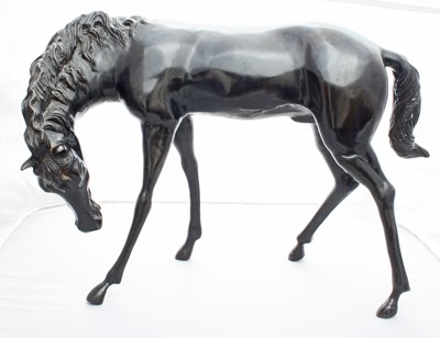 Lot 517 - A large bronze figure of a standing horse,...