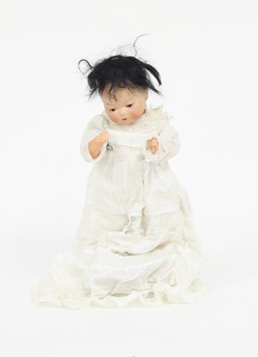 Lot 530 - An Oriental bisque head baby doll with fixed...