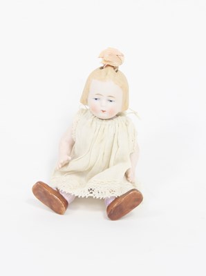 Lot 534 - A German bisque doll with painted eyes and...