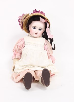 Lot 540 - A French bisque head doll with fixed eyes,...