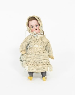 Lot 542 - A German bisque head doll with weighted eyes,...