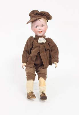 Lot 544 - A French bisque head boy doll with fixed eyes,...