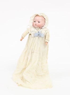 Lot 545A - A bisque head baby doll with fixed sleeping...