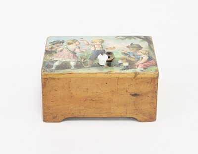 Lot 565 - A child's hand cranked musical box, transfer...