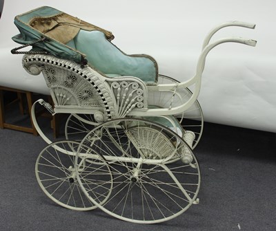 Lot 566 - A doll's Victorian pram with wicker body,...