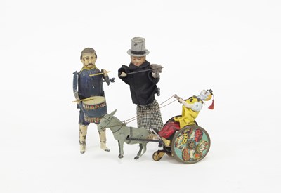 Lot 578 - Three clockwork tinplate toys, violinist,...