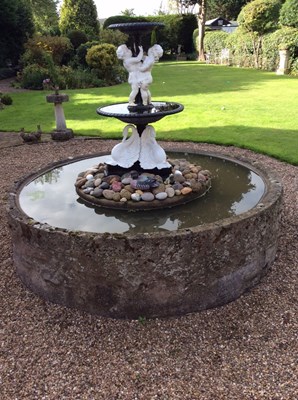 Lot 662 - A cast iron two-tier fountain, the top with...