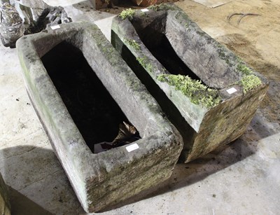 Lot 676 - A matched pair of rectangular stone troughs,...