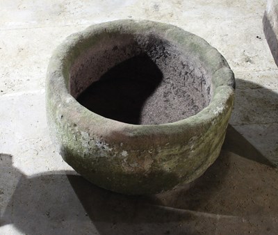 Lot 677 - A circular stone trough, 49cm diameter