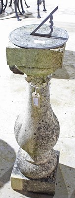 Lot 678 - A reconstituted stone sundial with baluster...