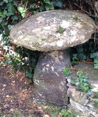 Lot 680 - A staddle stone with circular top and tapered...