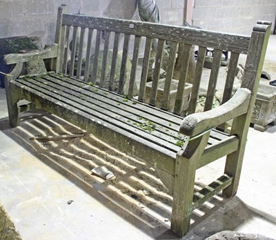 Lot 684 - A wooden slatted garden seat, 182cm wide